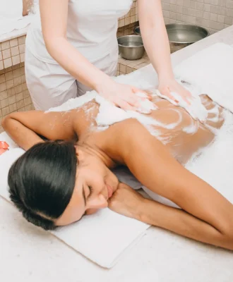 beautiful-mixed-race-woman-enjoys-foam-massage-in-2025-09-14-14-51-10-utc