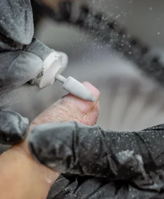 manicurist-fixing-nails-of-a-client-2026-01-08-00-24-01-utc (1)