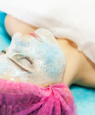 spa-therapy-for-young-woman-having-facial-mask-at-2025-02-14-17-23-35-utc